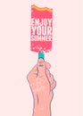 Enjoy Your Summer. Summer time phrase typographical grunge poster with bitten ice cream on a stick. Hand holds ice cream. Retro ve